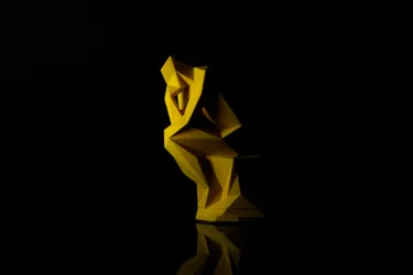 An abstract form made to resemble Rodin's Thinker